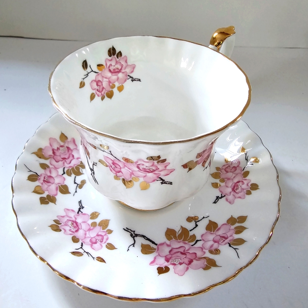 Vintage Royal Albert tea cup saucer with Pink Cherry Blossom and gold leafs